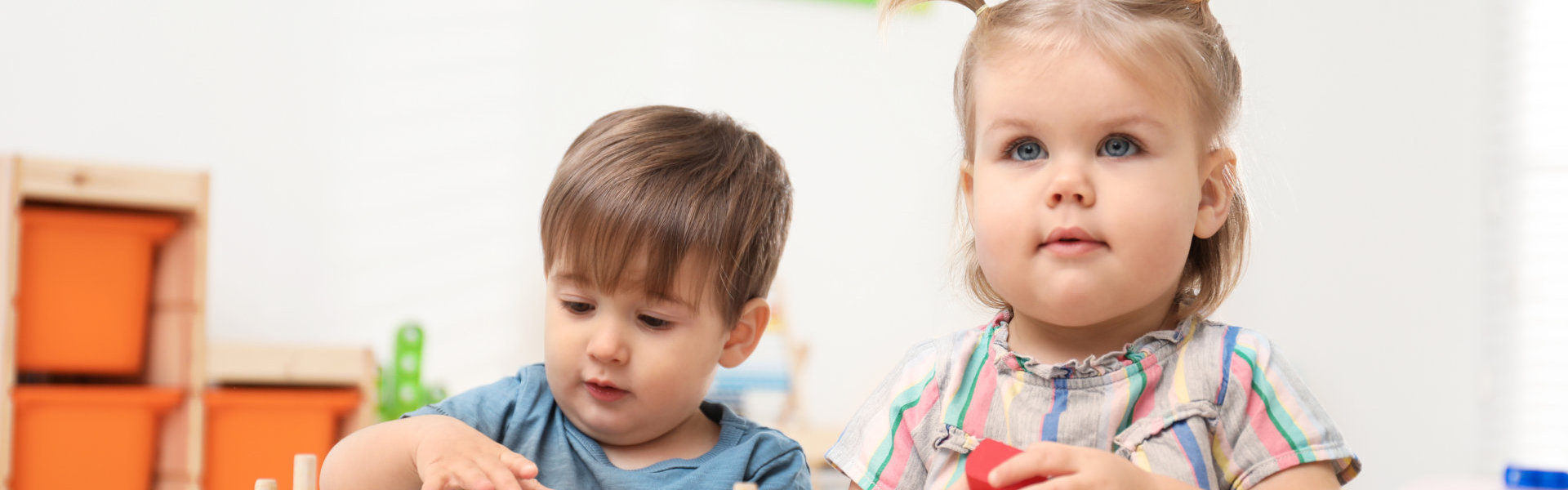 two kids playing in school